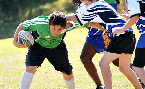 Ricky Brown from Jones Hill State Primary School presses hard in his team’s win over One Mile State Primary School. Ricky Brown from Jones Hill State Primary School presses hard in his team’s win over One Mile State Primary School.